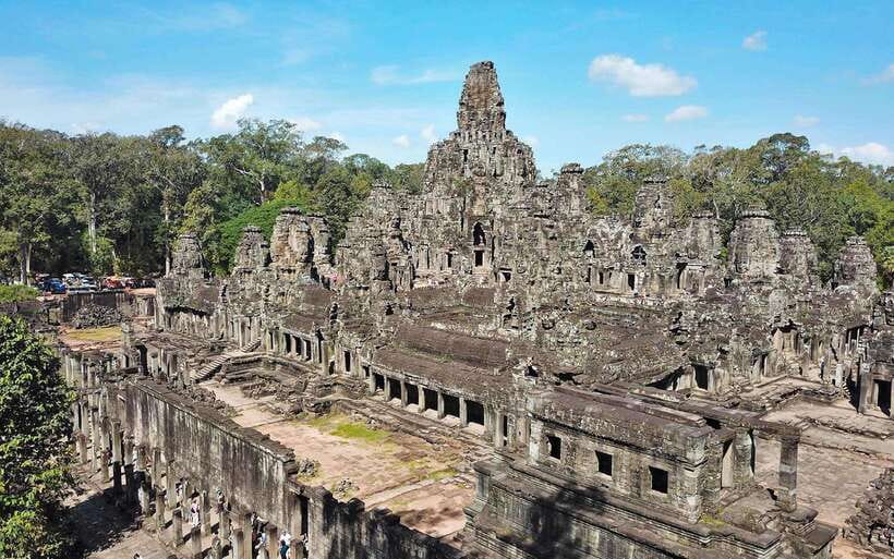 Siem Reap: Angkor Wat: Small-Group Sunrise or Sunset Tour - Angkor Thom and the many faces of Bayon
