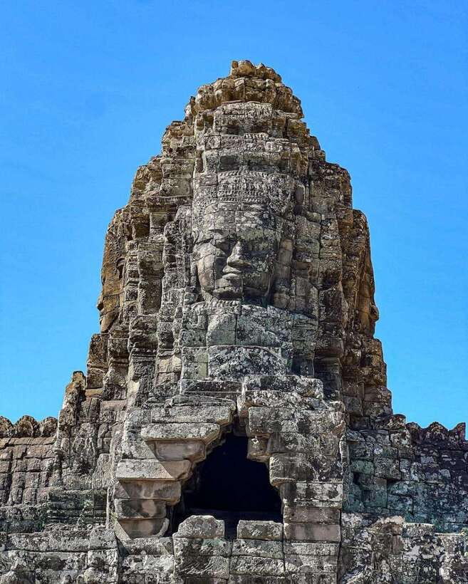 Siem Reap: Angkor Wat Small Group Tour with Spanish Guide - Angkor Thom and its stone faces