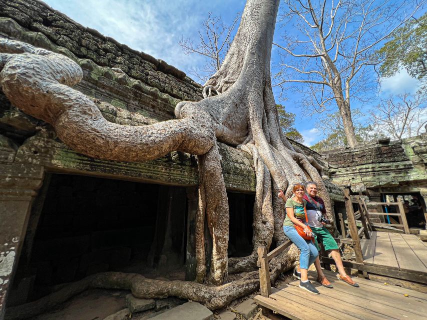 Siem Reap: Angkor Wat Sunrise and Market Tour by Jeep - Bayon’s calm faces and Angkor Thom’s gate