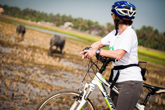 Siem Reap Countryside Guided Tour by Bike and E-Bike Private Tour - A village house, snacks, and a look at daily life