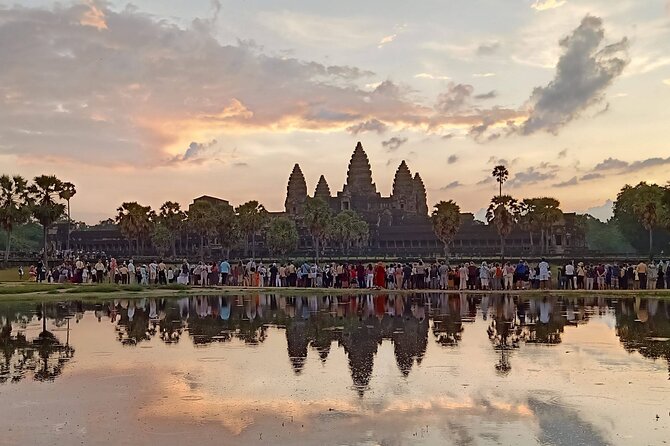 Siem Reap Private Day Tour: Angkor Wat Sunrise, Bayon & Ta Prohm - Angkor Thom’s gates and royal-era scale