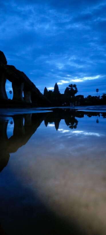 Siem Reap Private Tour: Angkor Wat Sunrise And Banteay Srei - Bayon and the stone faces of Angkor Thom