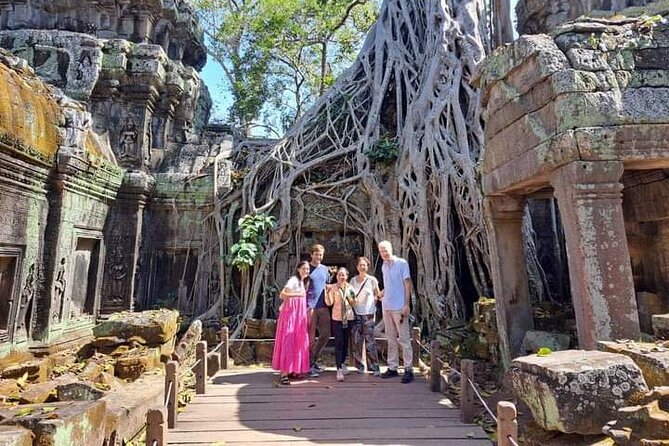 Siem Reap Tours -Explore Angkor Tour with Sunset - Angkor Thom’s South Gate and the face towers of Bayon