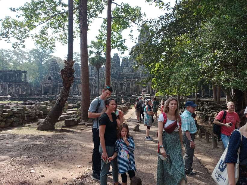 Sun Rise Small Group Day Tour in Temples of Angkor - Bayon’s stone faces and the heart of the royal city