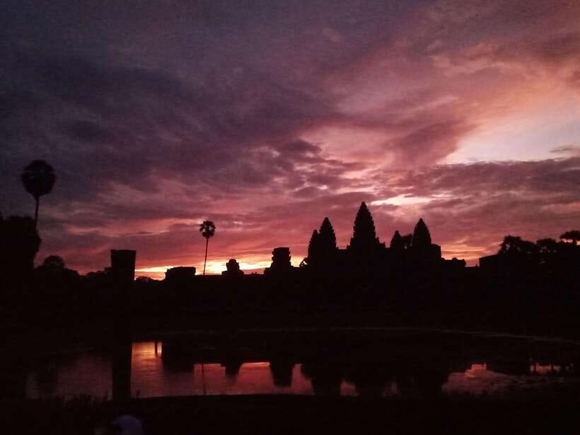 Sunrise at Angkor Wat with a sharing group - The pre-dawn start and first temple ticket stop