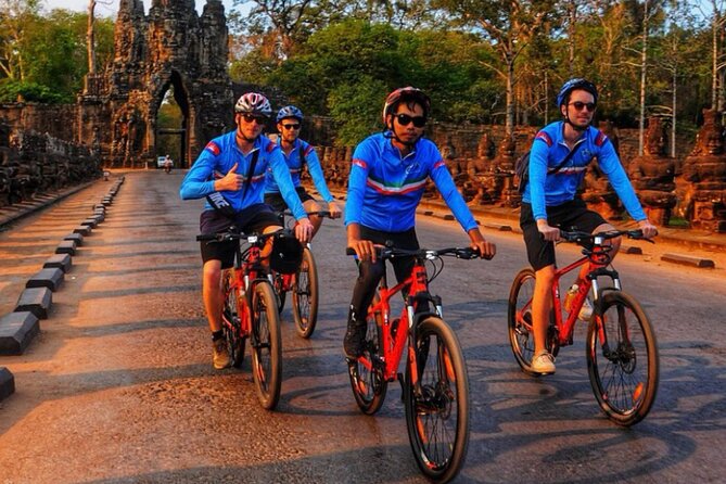 Sunrise Bike Tour At Siem Reap Angkor Wat - Crossing the bridge into Angkor Wat