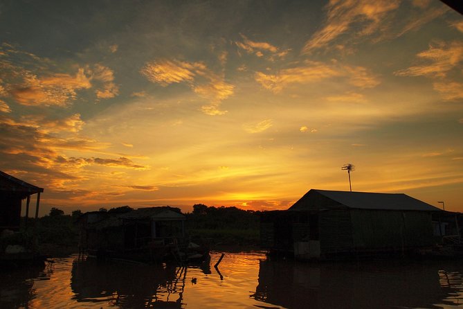 Sunset Cruise on the Mekong River from Phnom Penh - Boarding as the late light reaches the water