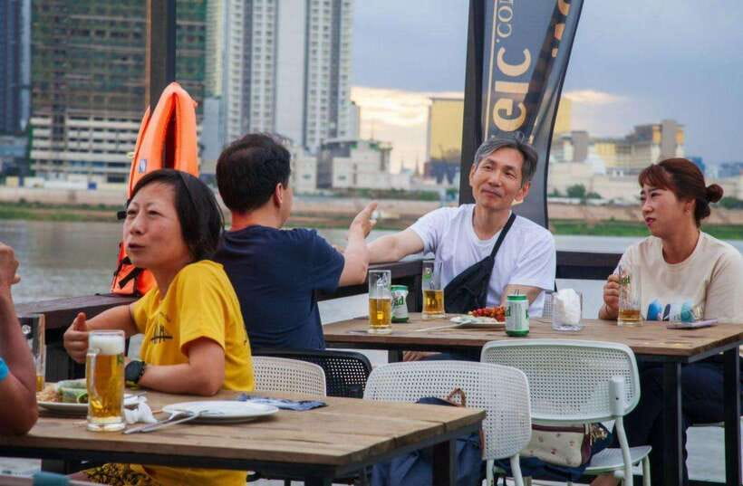 Sunset Cruise Unlimited BBQ Buffet, Cold Beers, Soft Drinks<em> – Key points before you book’ /></p>
<ul>
<li><strong>The Gold package combines an unlimited BBQ buffet, cold beers, soft drinks, and fresh fruit.</strong></li>
<li><strong>The 5pm departure can show you Phnom Penh in daylight, at sunset, and under city lights.</strong></li>
<li><strong>The cruise passes the Mekong, Tonle Sap, and Four Faces rivers, with river homes and fishing boats along the way.</strong></li>
<li><strong>Hotel pickup is included, but hotel drop-off is not. Plan your return before boarding.</strong></li>
<li><strong>Staff service is a major strength, with attentive hosts such as Hannah and Bamboo praised for keeping drinks topped up.</strong></li>
<li><strong>The cruise is best for couples, solo visitors, and small groups wanting an easy evening rather than a detailed history tour.</strong></li>
</ul>
<h2 id="starting-with-a-tuk-tuk-pickup-near-phnom-penh">Starting with a tuk-tuk pickup near Phnom Penh</h2>
<p><img width="615" height="820" decoding="async" src=
