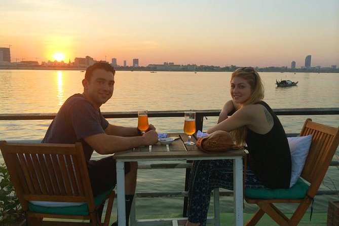 Sunset Cruise with unlimited beer & soft drinks -English speaking guide on board - Diamond Island, fishing boats, and stilted homes