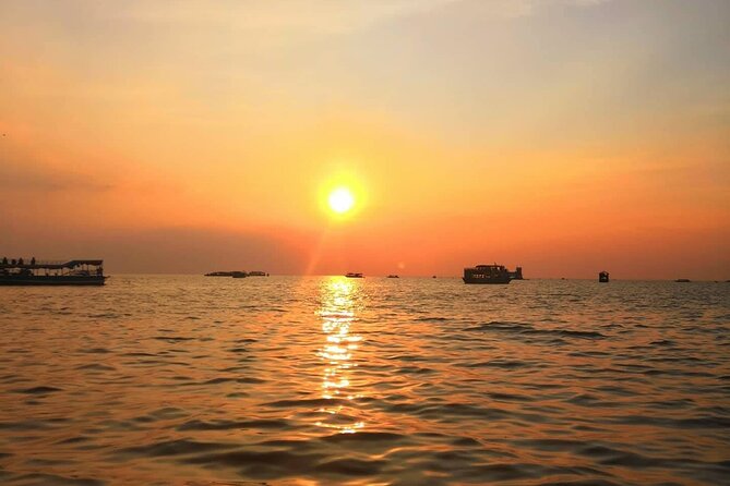 Sunset Dinner and drinks includes a Floating Village cruise tour. - The Queen Tara riverboat and the sunset view