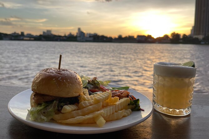 Sunset & Evening Dinner Cruise With One Way Free Pick Up - Returning after dark for Phnom Penh’s lights