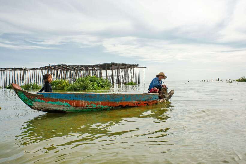 Sunset Over the Tonle Sap Lake and Visit Floating Village - Boarding the boat at Tonle Sap