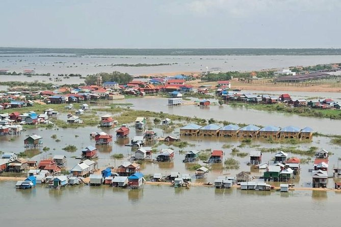 Tonle Sap Lake and Kampong Phluk Village Private Half Day Tour - The local boat ride across Tonle Sap