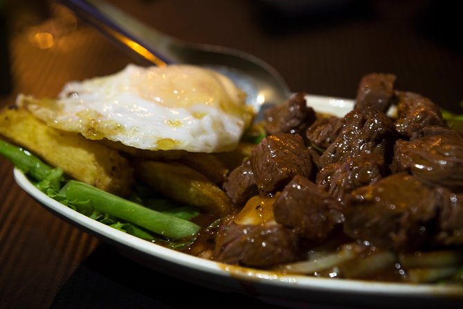 Ultimate Phnom Penh Food Tour by Tuk Tuk: 20 Tastings and Drinks - Independence Monument dessert from an evening roadside stall
